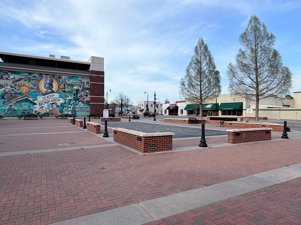 Public plaza beside the museum mural in Broken Arrow